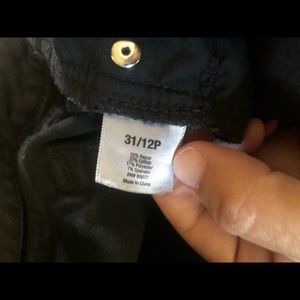 Ladies black distressed stretch jeans